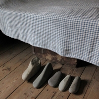 Cold Feet Under the Blanket, 2010 (stones from the Arctic Ocean, museum interior)