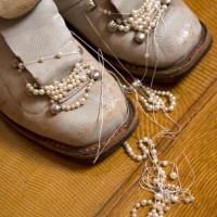 After Ski, 2005 (women´s skiing shoes, pearls)