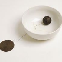 The Idea Of A Hole, 2002 (found broken dish, crocheting) 